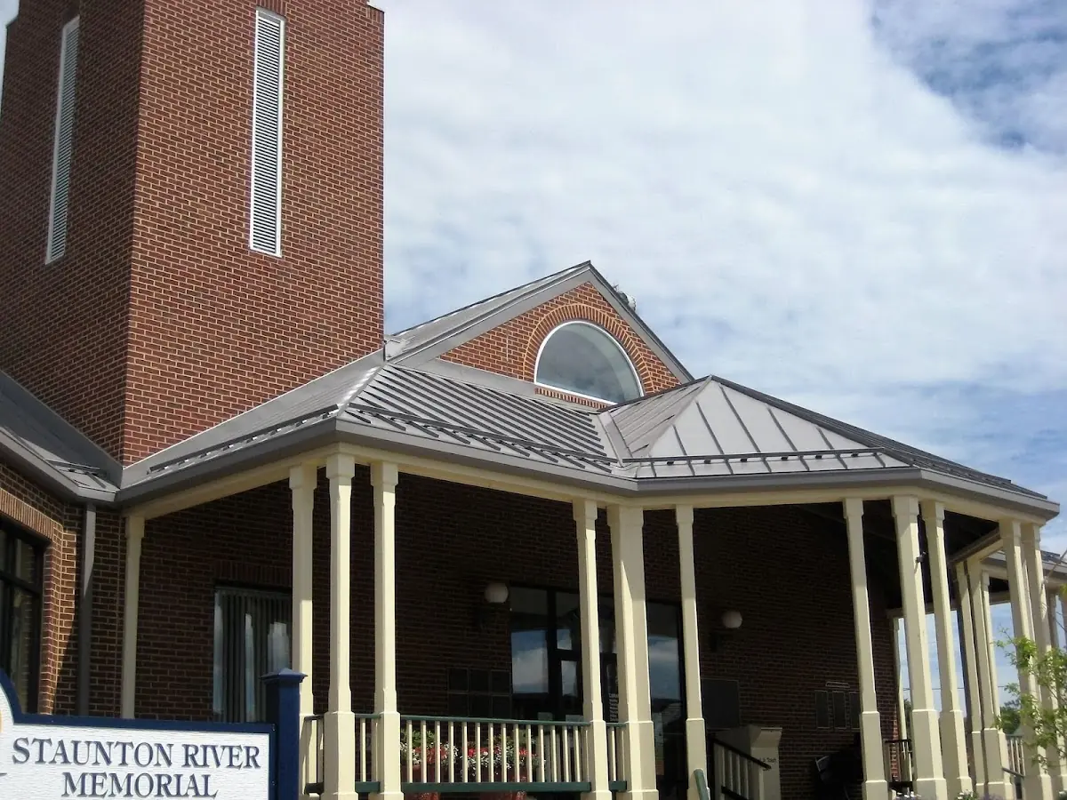 Skilled roofing craftsmen working on a residential roof in Upper Freehold
